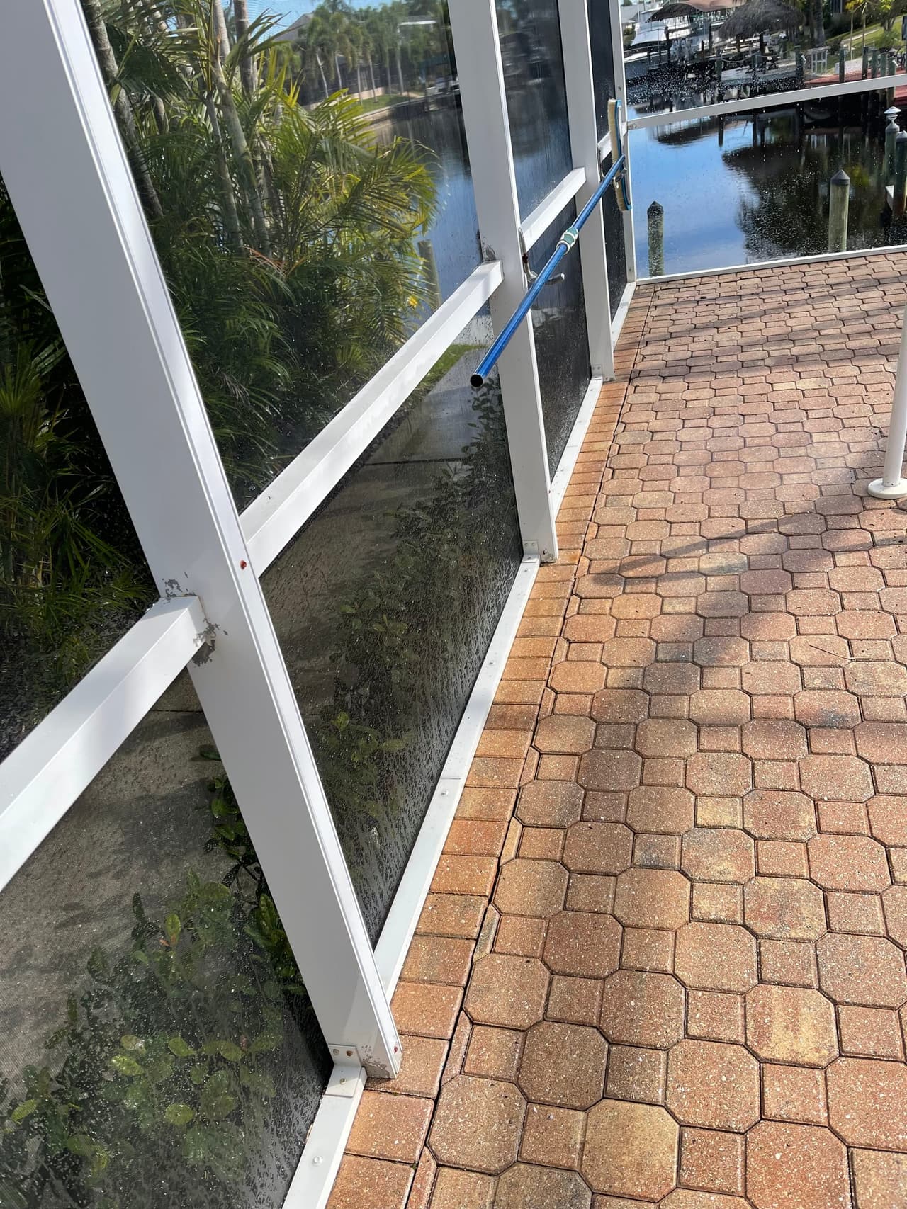 Cleaning a pool screen enclosure in Cape Coral, FL
