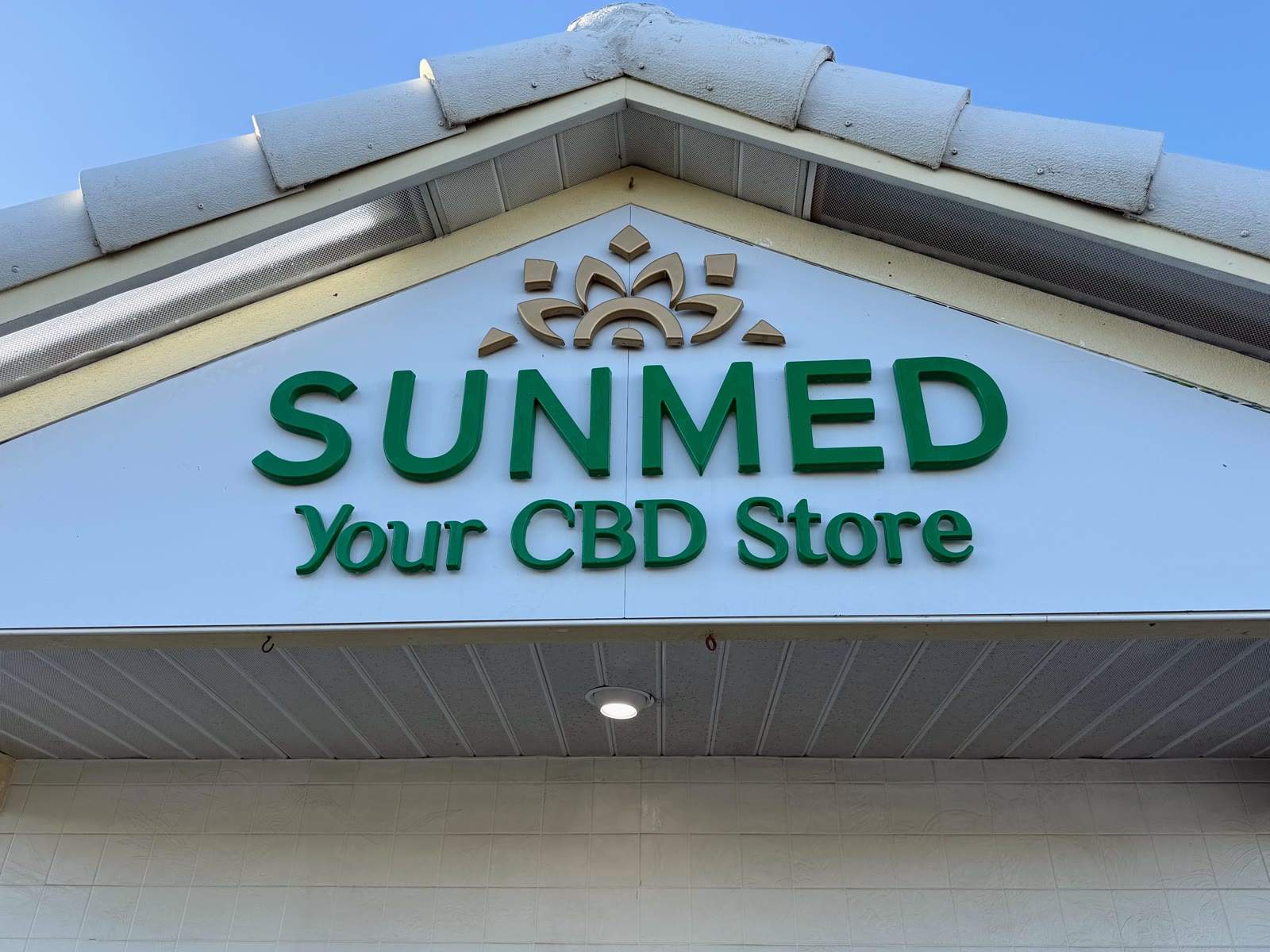Clean commercial storefront sign and facade in Fort Myers